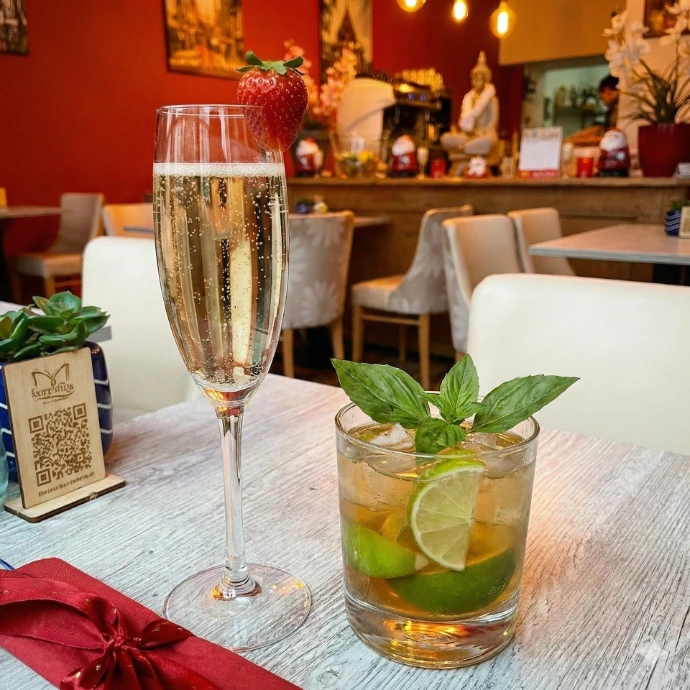 Glass of cava and the sabai sabai cocktail